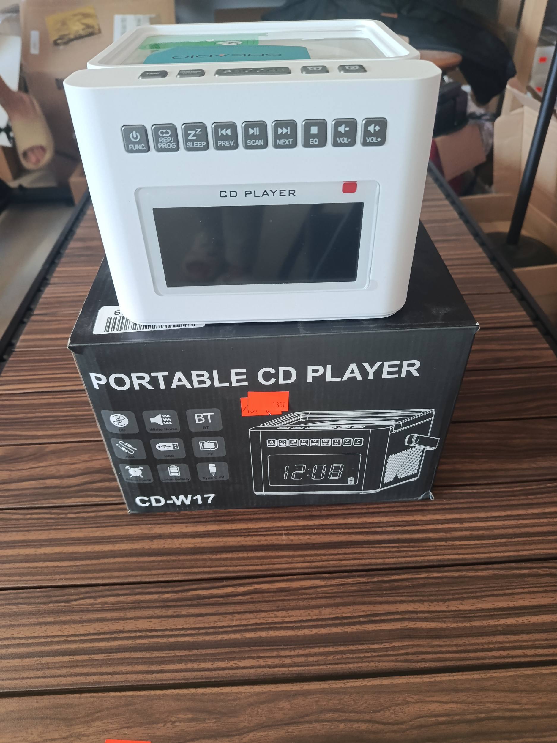 Przenośny odtwarzacz CD z funkcją zegara i budzika